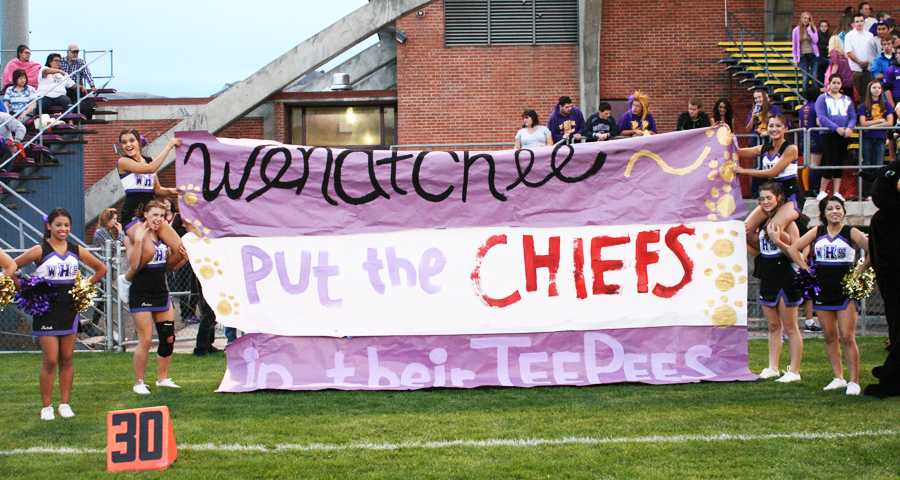WHS+cheerleaders+welcome+the+Panthers+to+the+field+before+the+Panthers+dominated+the+Moses+Lake+Chiefs.+