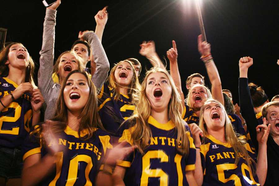 Wenatchee High School's student section cheers on classmates. 