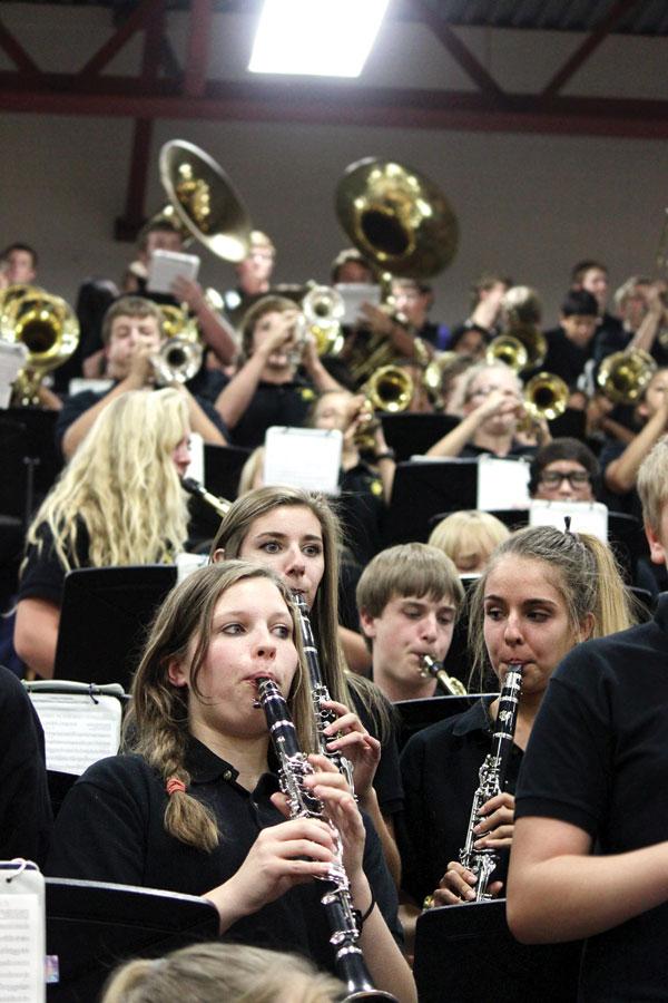 Sophomores Erin Wisemore, Candra Moon-Smith and Megan Sand play clarinet with the GA Band at a pep assembly on Sept. 27.
