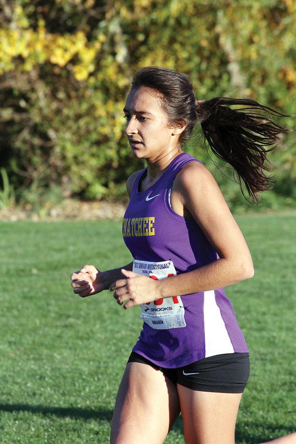 Junior Raquel Thody runs at Walla Walla Point Park during the second league meet of the season on Oct. 22. The girls team placed third. Eisenhower took first, followed by Eastmont.