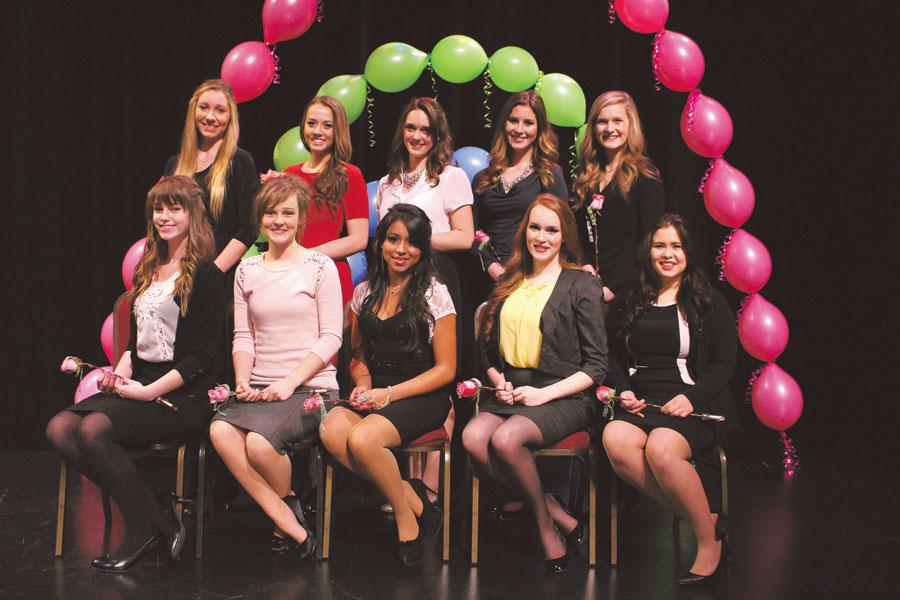 Top from left to right: Seniors Olivia Janney, Gabe Mercer, Roslyn Thompson, Caroline Dahl, Madison Ransford, Katie Hoag, Emily Millard, Lupe Martinez, Nikara Morgan, Amber Frodsham are named the Top 10 candidates for the 2014 Apple Blossom Royalty Pageant at the Performing Arts Center on Jan. 8.  Five girls from each Wenatchee High School and Eastmont High School were chosen.
Below: The candidates spell out their next speech topic, “You only live once” that they will read during the 2014 Apple Blossom Royalty Pageant on Feb. 8 at 7 p.m. at the Wenatchee High School auditorium.