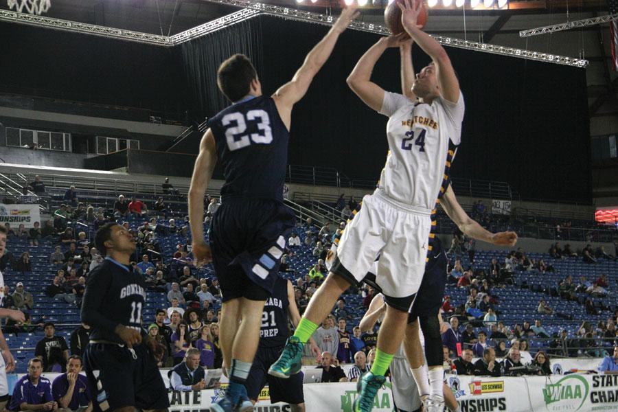 Senior Dillon Sugg shoots at the State basketball tournament, held at the Tacoma Dome, against Gonzaga Prep on March 7.