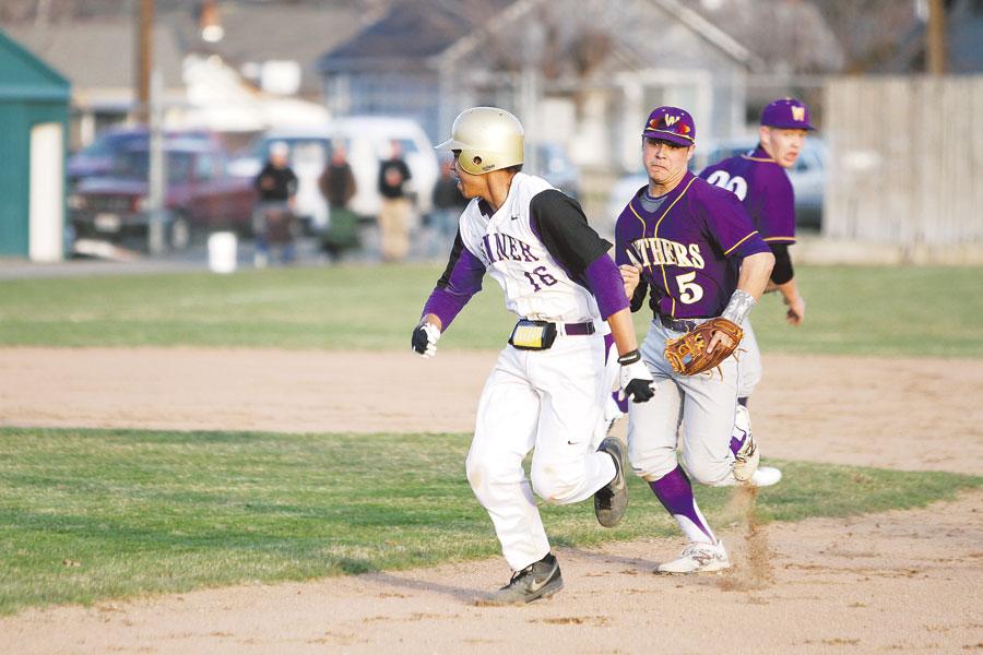 Junior Jacob Prater, second baseman for the team chases his opponent back to first base on an attempted steal on March 23. Prater’s batting record for the game was three for three, however the Panthers lost 3-2 against Sumner. 