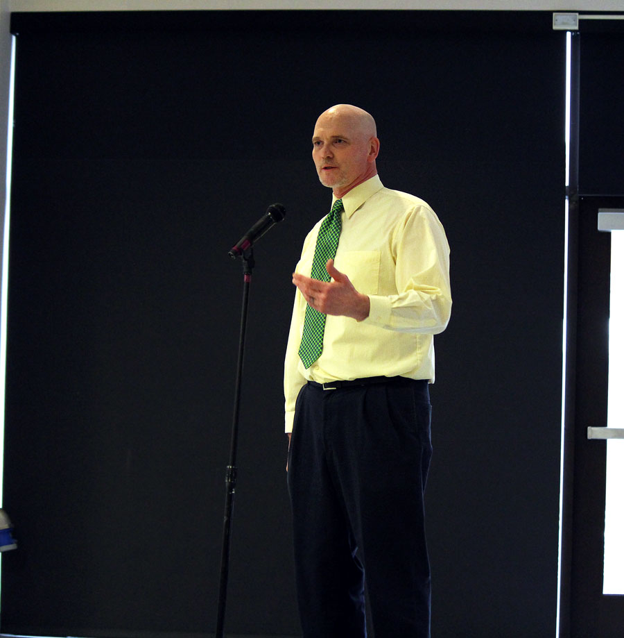 Newly announced Athletic Director Jim Beeson answers a question during the public forum on April 10,  in the WHS commons.