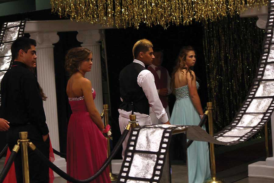 Juniors Jacob Prater, Carlie Heuple, Manny Gonzalez, and Carley Gangle walk the red carpet at Prom on May 31. Prom was hosted at the Town Toyota Center for the second year in a row.