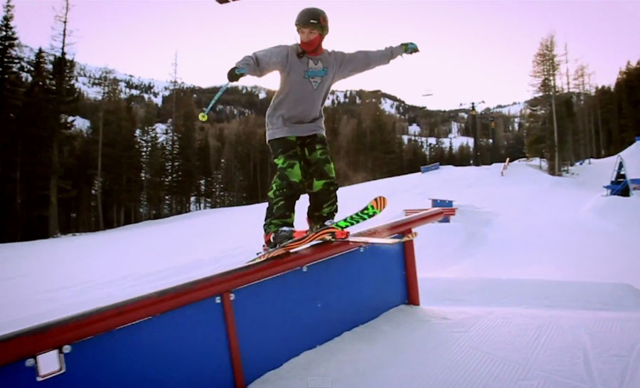 Sophomore downhill skier Trever Wyles pretzel-grinds a down rail at Mission Ridge’s #100laps terrain park last winter.