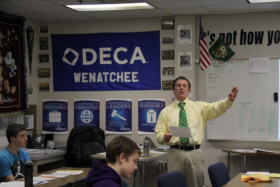 DECA Adviser Matt Pakinas teaches a marketing class at Wenatchee High School on Wednesday.