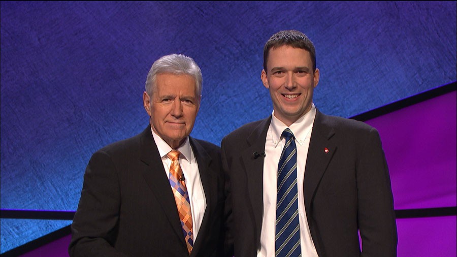 Assistant Principal Dave Perkins on the set of Jeopardy in California with host Alex Trebek. 