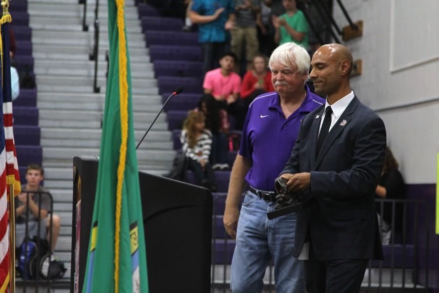 Retiring social studies teacher Jay Young receives the Heart of the Panther Super Staff award.