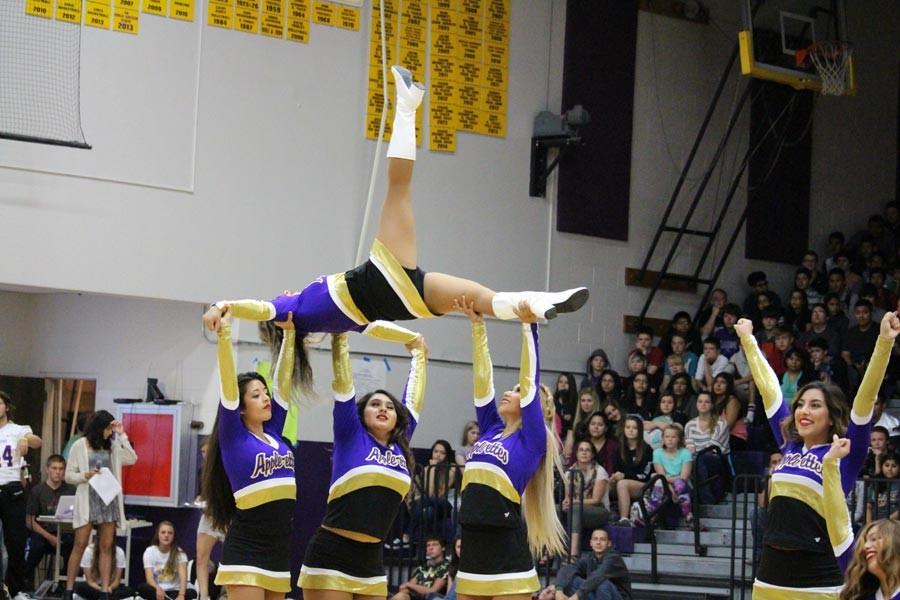 The Wenatchee High School Applettes perform a dance routine at the pep assembly.