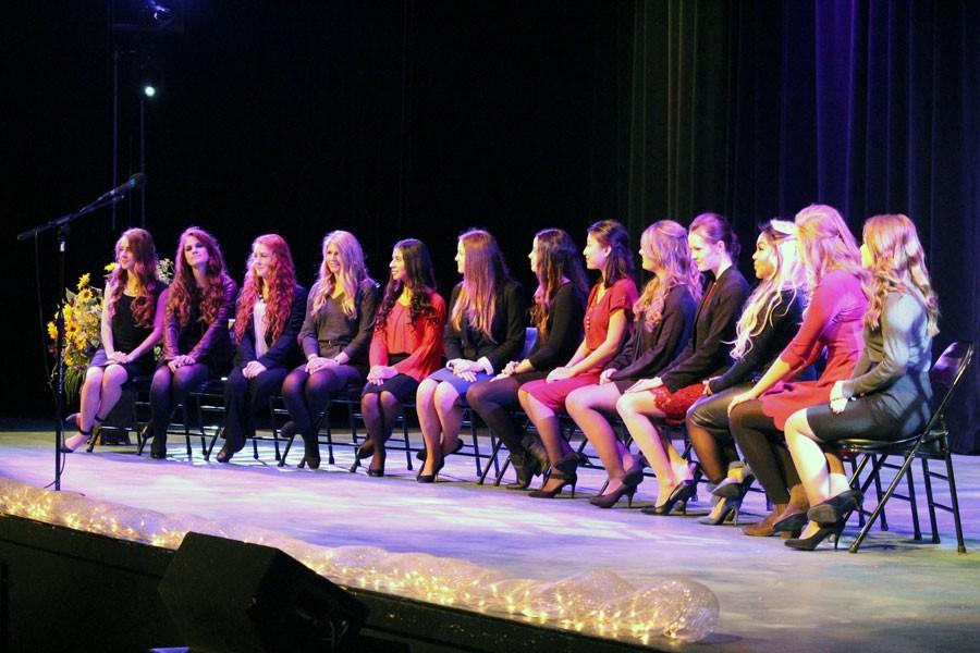 The top thirteen Apple Blossom candidates from Wenatchee High School prepare for their speeches. 