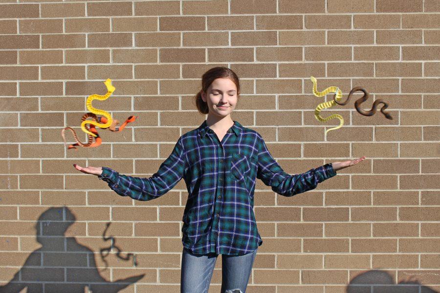 Sophomore Olive Ryan hangs out with her fellow snakes. 