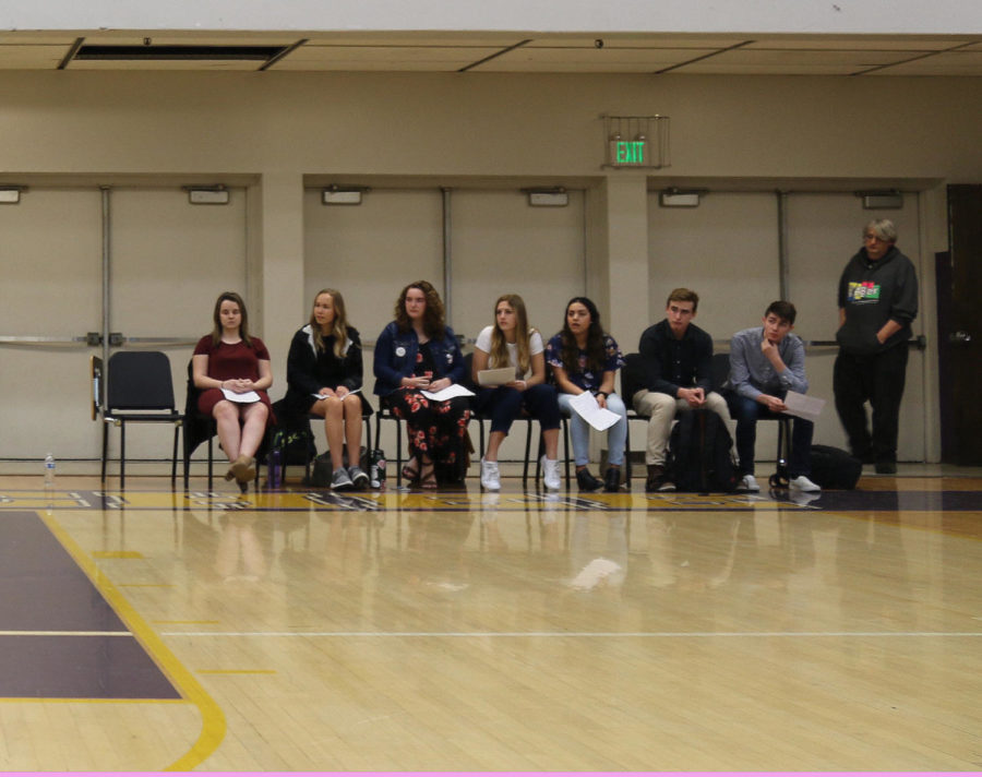 ASB  executive candidates listen to a campaign speech
